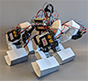 DOQ: A Dynamic Origami Quadrupedal Robot